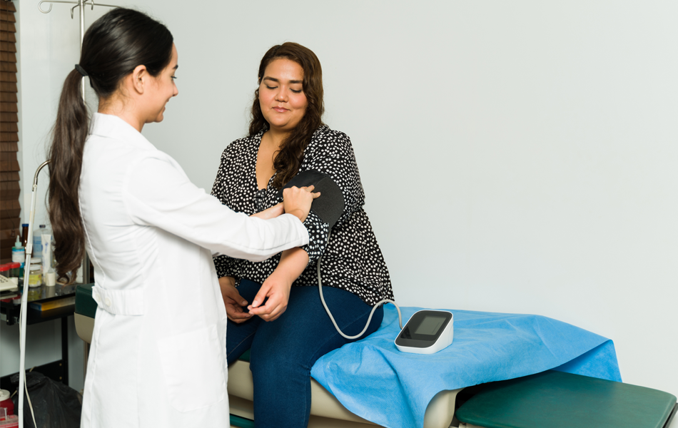 Woman speaking to doctor